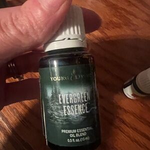 Young Living Evergreen Essence Oil in Dark Green